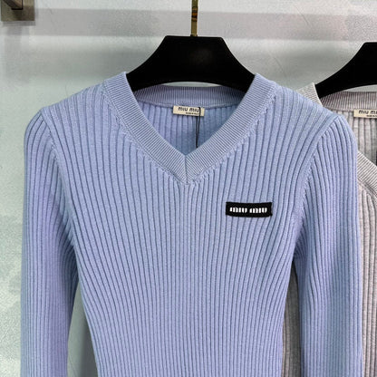 Ribbed High-Neck Wool Sweater